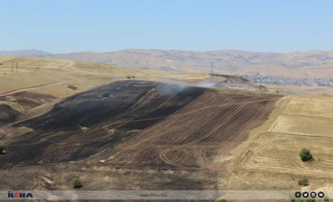 Palu`da Tarım arazilerinin ortasındaki çöplükte çıkan yangınlar çiftçilerin emeklerini heba ediyor 
